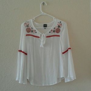White long sleeve shirt with flower designs